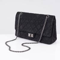 Chanel Black Aged Caviar Double Flap Handbag - Sold for $3,072 on 05-17-2026 (Lot 632).jpg